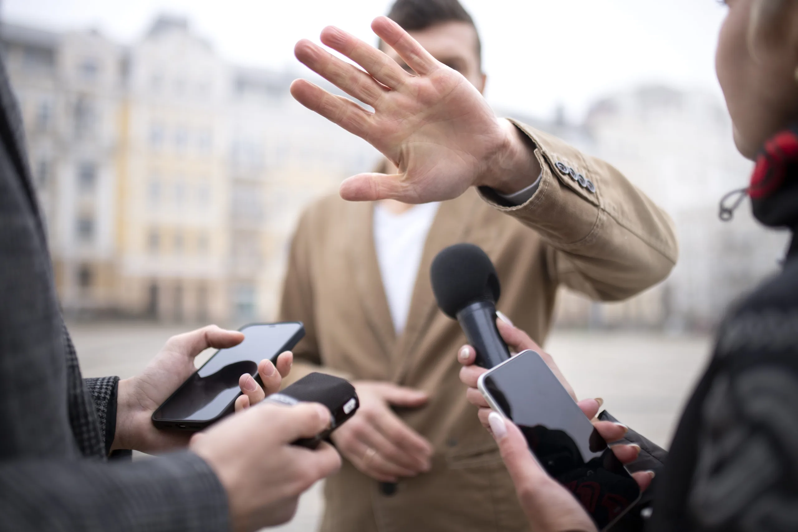 close-up-reporter-taking-interview-min